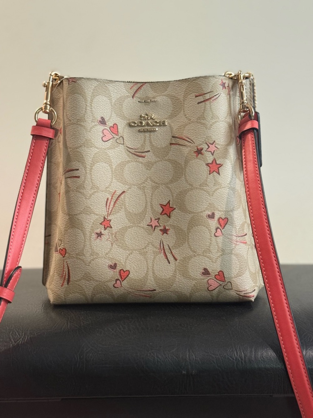 Coach Metallic Gold Signature Crossbody with Pink Accent Stars